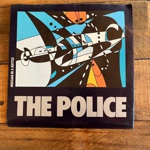 The Police - 45 RPM Message in a Bottle/Landlord. Cover is a poster.  1979